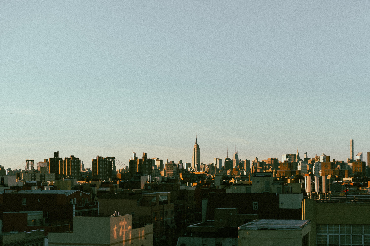 New York rooftops photographed in warm evening light